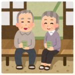 縁側でお茶を飲む老夫婦